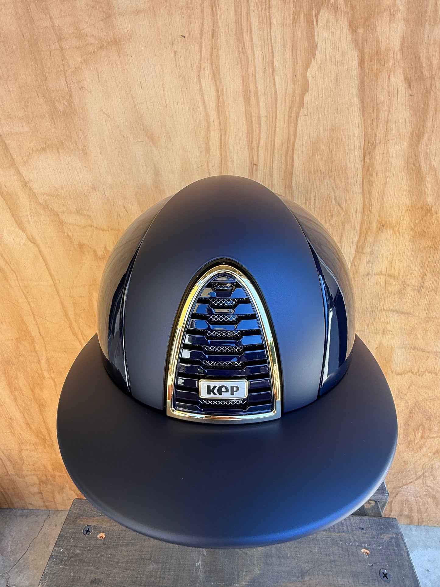 KEP POLO POLISHED BLUE WITH MATTE FRONT AND BRIM, GOLD FRAME